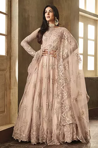 Soft net party wear gown peach color with zari with embroidery & stone work