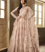 Soft net party wear gown peach color with zari with embroidery & stone work