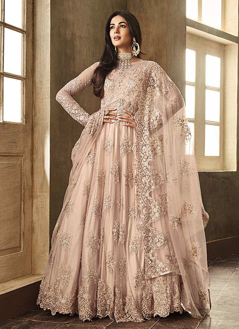 Soft net party wear gown peach color with zari with embroidery & stone work