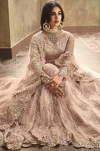 Soft net party wear gown peach color with zari with embroidery & stone work