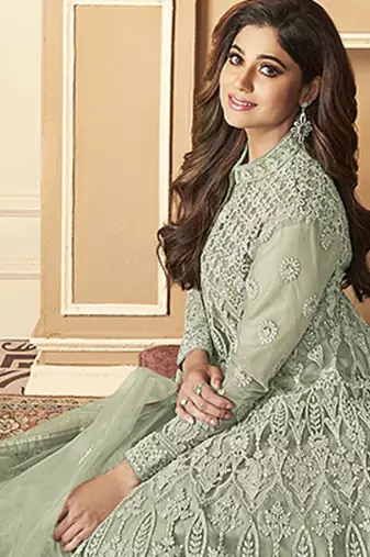 Butterfly net fabrics party wear readymade gown in light green color with embroidery work