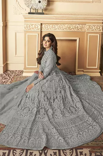 Butterfly net fabrics party wear readymade gown in grey color with embroidery work