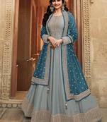 Dola silk party wear gown in grey color with embrodiery work and stone work