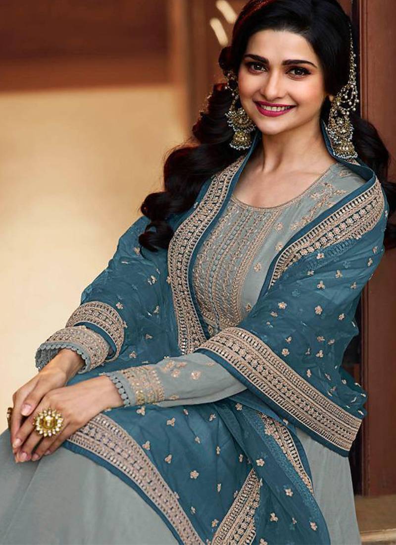 Dola silk party wear gown in grey color with embrodiery work and stone work