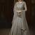 Soft butter net wedding wear gown in grey color with embrodiery & swarovski work