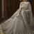 Soft butter net wedding wear gown in grey color with embrodiery & swarovski work