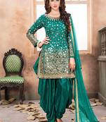 Satin silk party wear salwar suit in turquoise color with embrodiery work,stone ,mirror work
