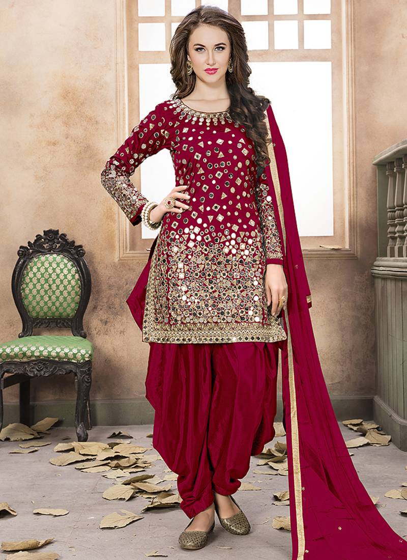 Satin silk party wear salwar suit in red color with embrodiery work,stone ,mirror work