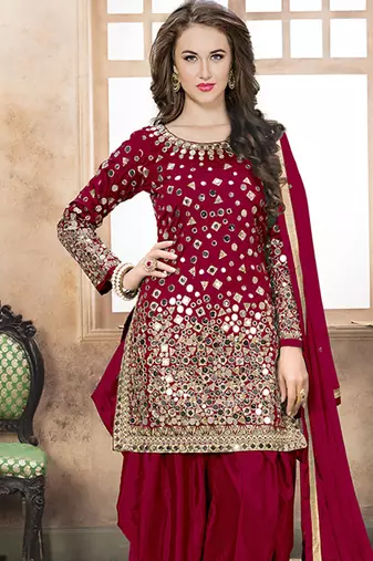 Satin silk party wear salwar suit in red color with embrodiery work,stone ,mirror work