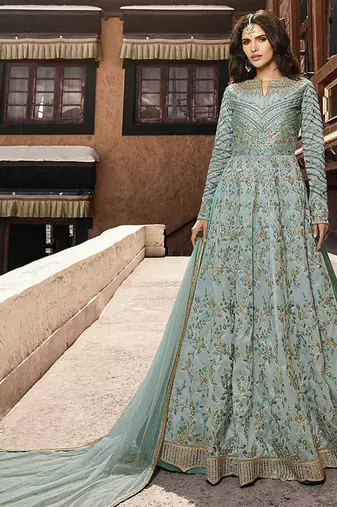 Soft silk party wear gown in light blue color with embroidery work & stone work