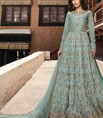 Soft silk party wear gown in light blue color with embroidery work & stone work