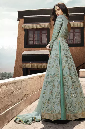 Soft silk party wear gown in light blue color with embroidery work & stone work