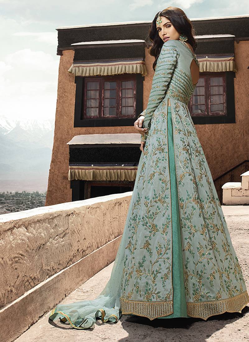 Soft silk party wear gown in light blue color with embroidery work & stone work