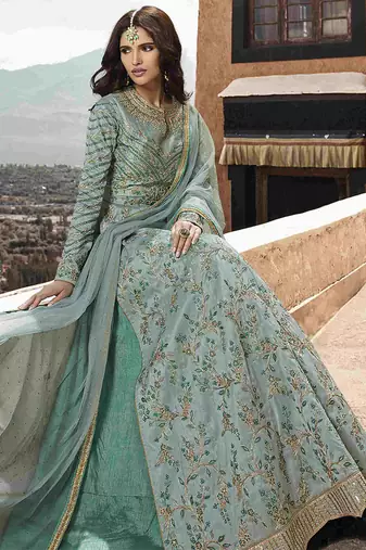 Soft silk party wear gown in light blue color with embroidery work & stone work