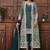 Butterfly net fabric party wear suit in turquoise color with embroidery & crystal stone work