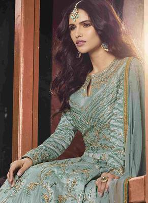 Soft silk party wear gown in light blue color with embroidery work & stone work 4