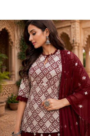 Maroon Elegant Embroidered Kurti With Flowy Sharara And Soft Net Dupatta Perfect For Festive And Wedding Looks 5