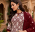 Maroon Elegant Embroidered Kurti With Flowy Sharara And Soft Net Dupatta Perfect For Festive And Wedding Looks