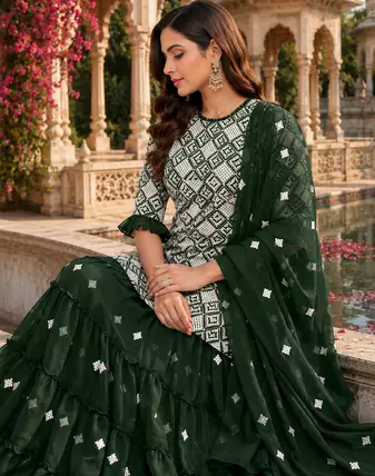 Green Graceful Sharara Set With Elegant Embroidery And Dreamy Royal Vibes Perfect For Festive Celebrations.