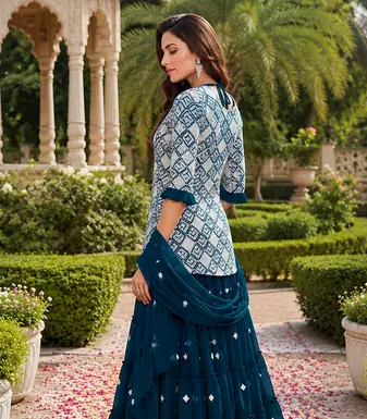 Teal Blue Elegant Embroidered Kurti With Flowy Sharara And Soft Net Dupatta Perfect For Festive And Wedding Looks