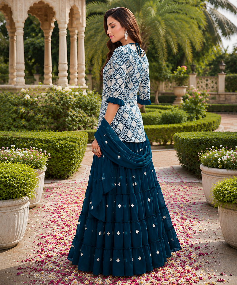 Teal Blue Elegant Embroidered Kurti With Flowy Sharara And Soft Net Dupatta Perfect For Festive And Wedding Looks