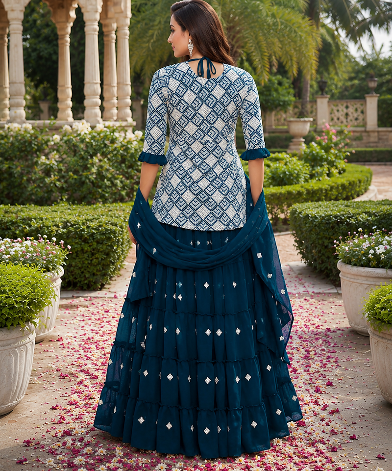 Teal Blue Elegant Embroidered Kurti With Flowy Sharara And Soft Net Dupatta Perfect For Festive And Wedding Looks