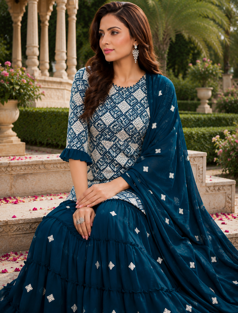 Teal Blue Elegant Embroidered Kurti With Flowy Sharara And Soft Net Dupatta Perfect For Festive And Wedding Looks