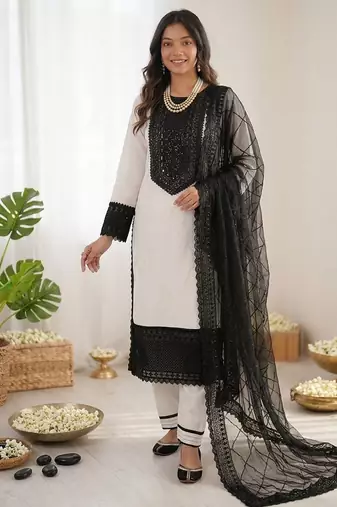 Off white crepe thread with sequin salwar suit