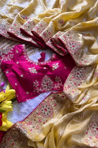 yellow golden embroidery with dori and sequins silk saree