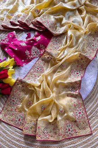 yellow golden embroidery with dori and sequins silk saree