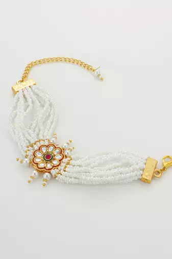 red floral motif pearl bracelet