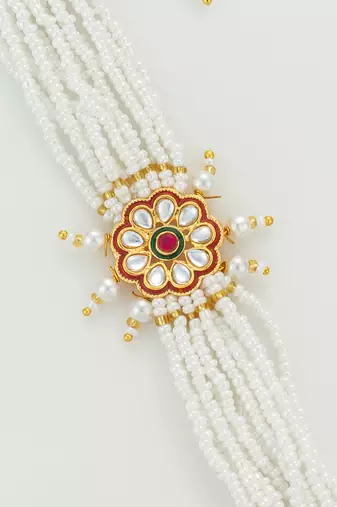 red floral motif pearl bracelet
