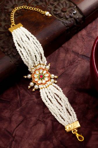 red floral motif pearl bracelet