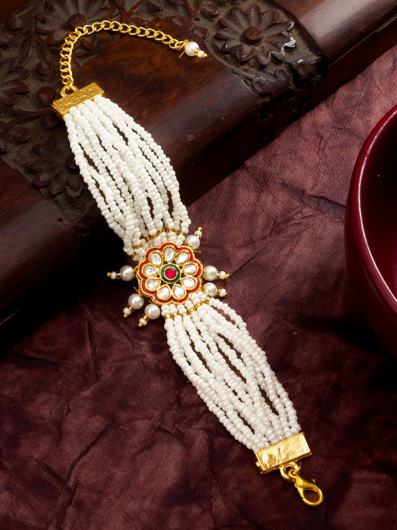 red floral motif pearl bracelet