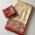 cream-red digital printed saree with contrast colour blouse dola silk saree