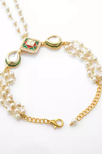 white beaded kundan haathphool