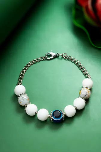 white beaded evil eye bracelet