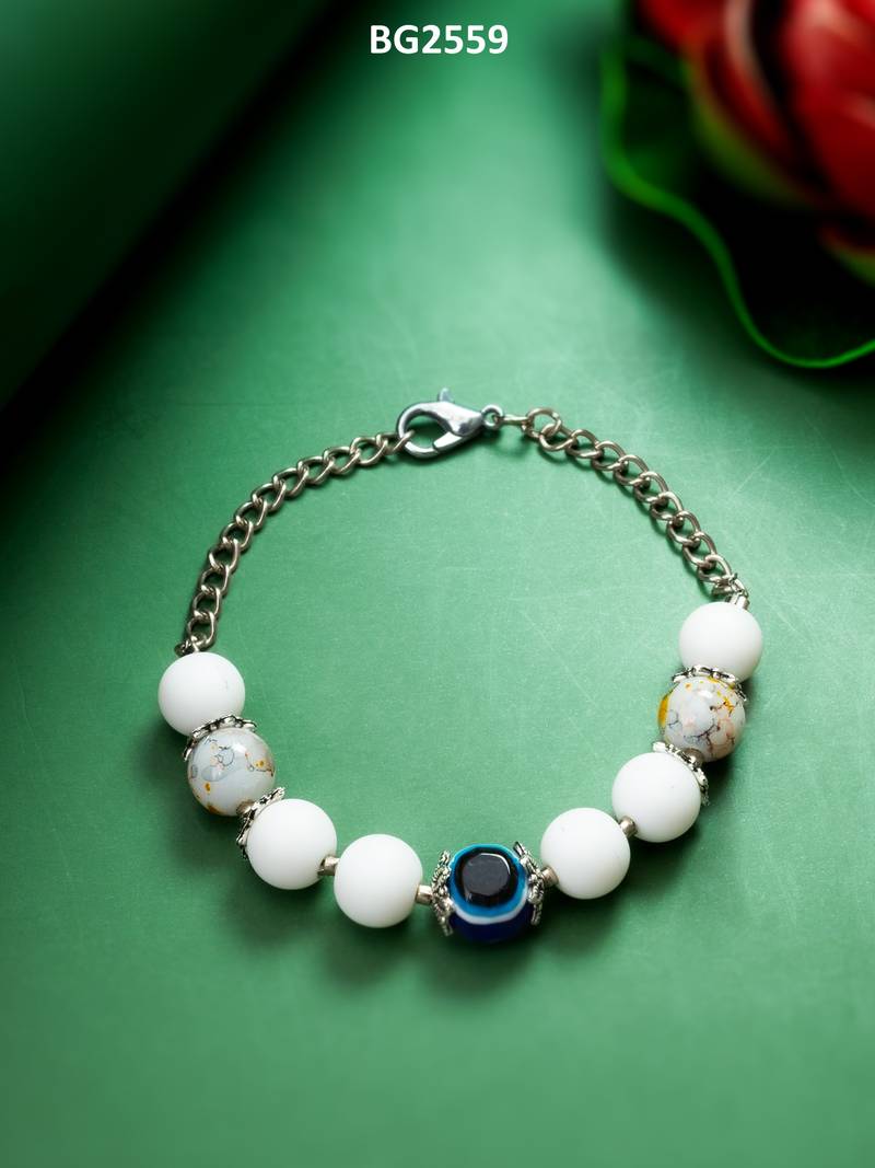 white beaded evil eye bracelet