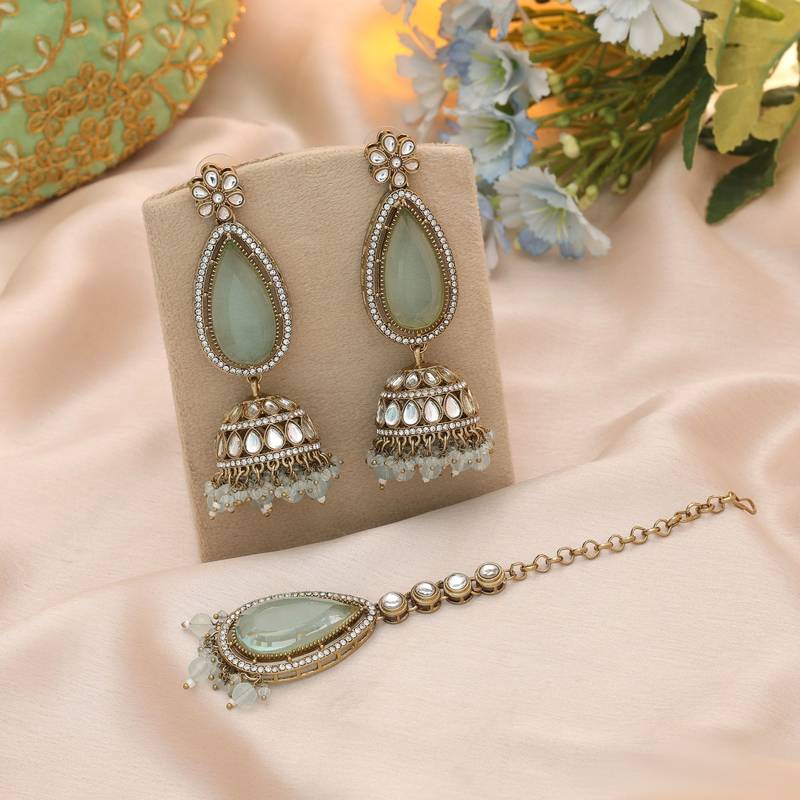Sky blue color kundan earrings tikka set