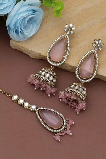 Light pink color kundan earrings tikka set