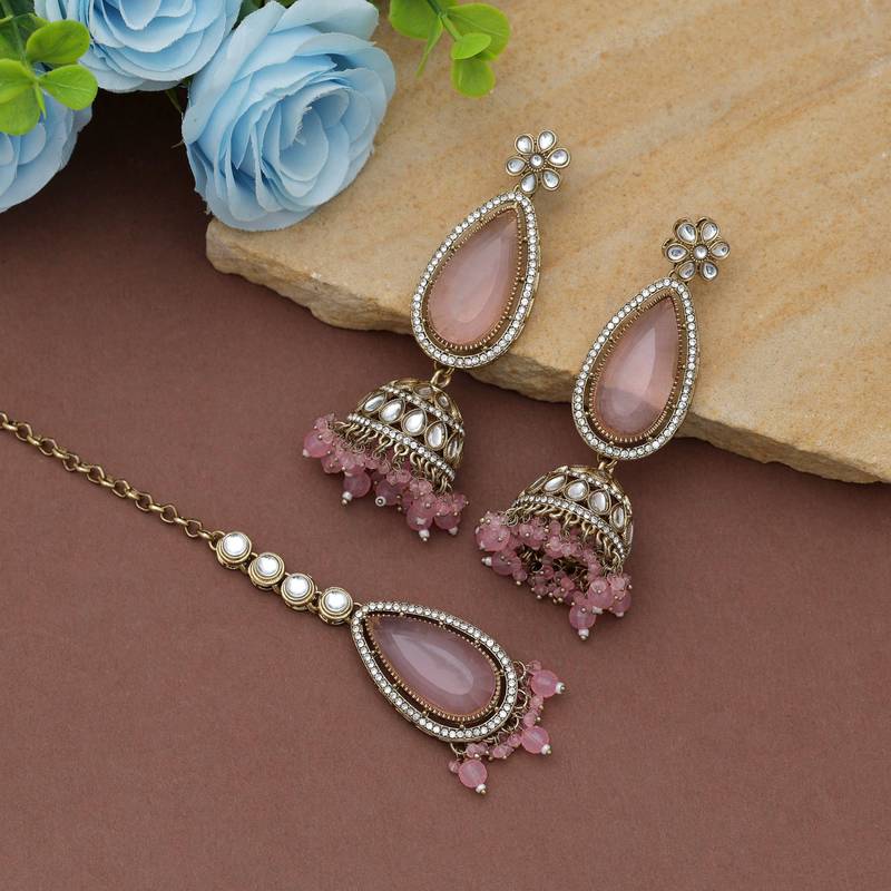Light pink color kundan earrings tikka set
