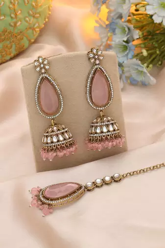 Light pink color kundan earrings tikka set