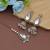 White color kundan earrings tikka set