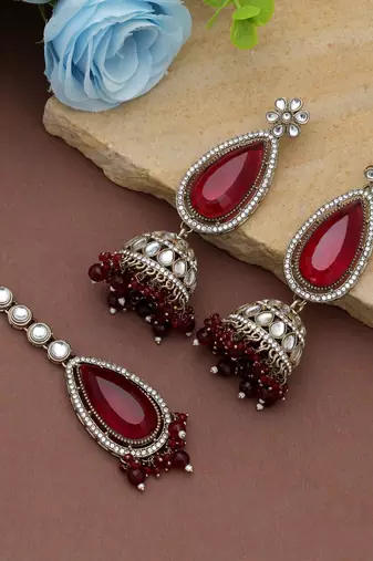 Maroon color kundan earrings tikka set