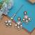 White color kundan earrings tikka set