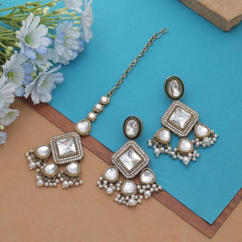 White color kundan earrings tikka set