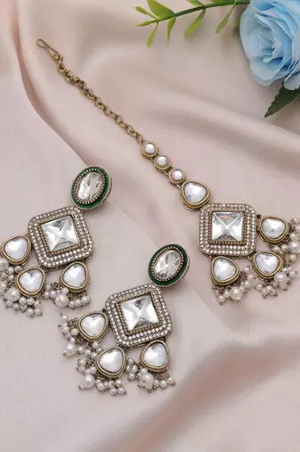 White color kundan earrings tikka set