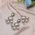 White color kundan earrings tikka set