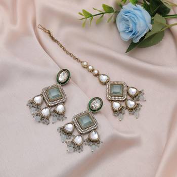 Sky blue color kundan earrings tikka set 1