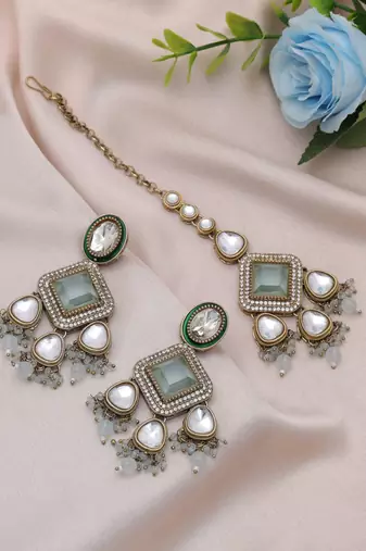 Sky blue color kundan earrings tikka set